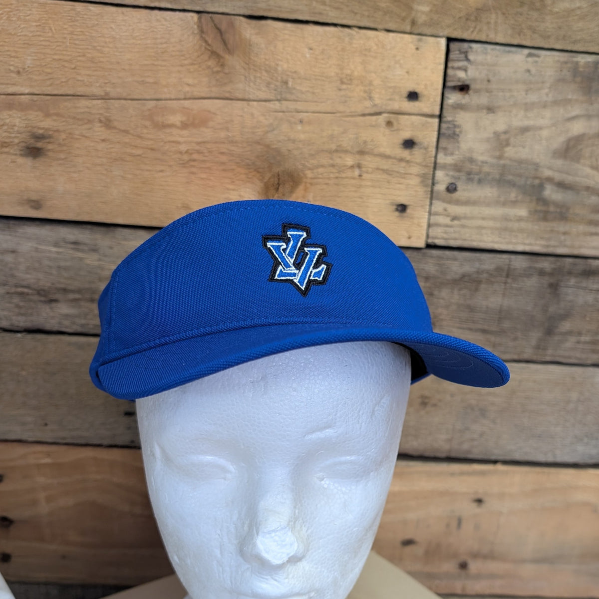 Leavenworth Pioneers royal blue embroidered LV visor shown on a mannequin